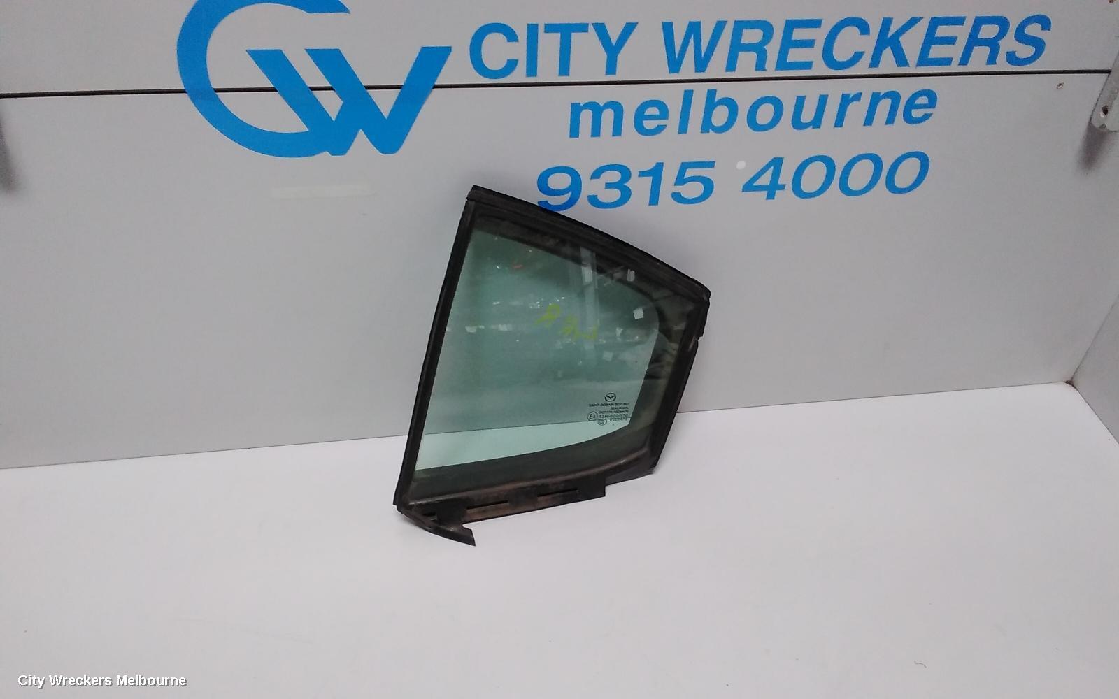 MAZDA 3 2016 Left Rear 1/4 Door Glass